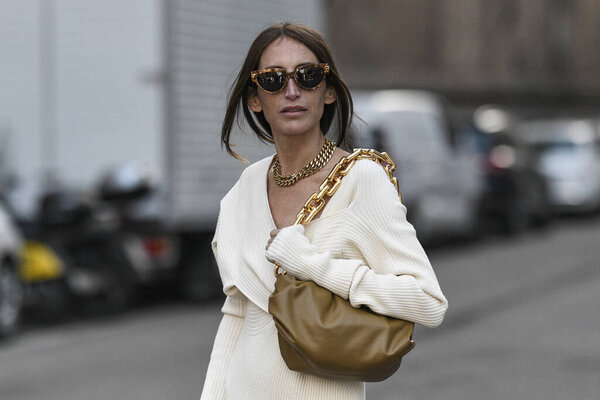 Milan, Italy - February 20, 2020: Street style appearance during Milan Fashion Week - streetstylefw20