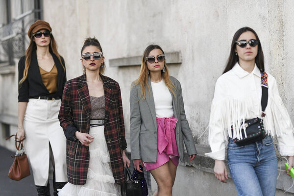 Milan, Italy - February 20, 2020: Street style appearance during Milan Fashion Week - streetstylefw20