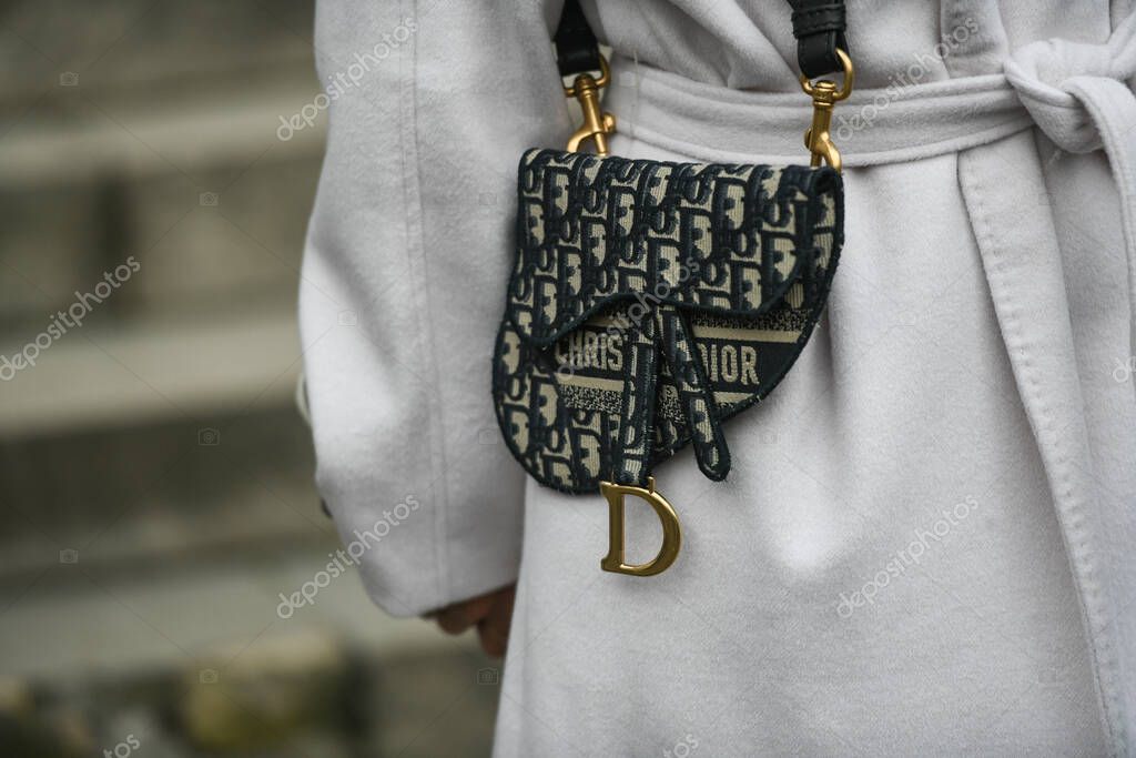 Paris, France - February 27, 2020: Christian Dior purse detail - streetstylefw20