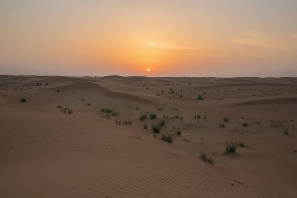 Pôr do sol sobre dunas de areia — Fotografia de Stock
