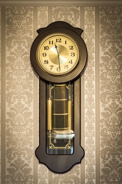 Wall clock with pendulum