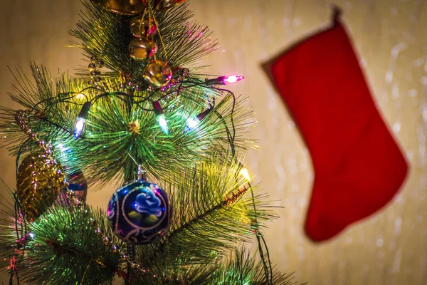 Christmas tree and red sock — Stock Photo, Image