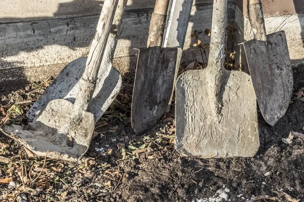 Dirty construction shovels