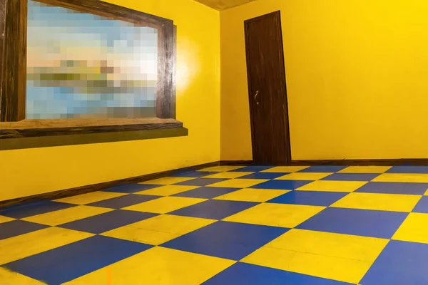 Fragment of a yellow room of illusions.