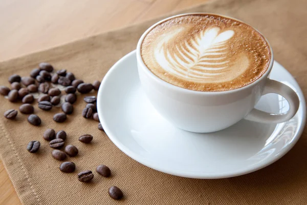 Rosetta en una taza de café . — Foto de Stock