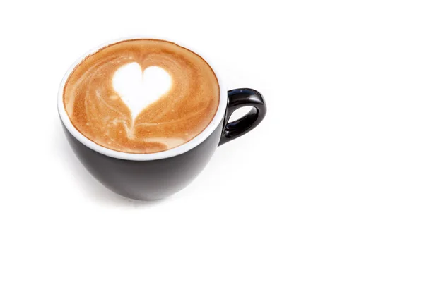 Xícara de café de forma de coração arte latte no fundo branco isolado — Fotografia de Stock