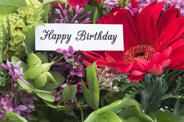 Mutlu doğum günü kartı withf bahar çiçekleri — Stok fotoğraf