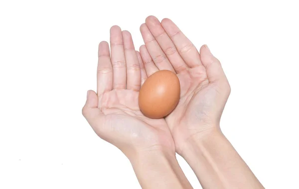 Mano tenendo uovo giorno di Pasqua — Foto Stock