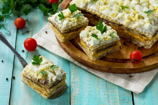 Snack cake on waffle cakes with herring pate, mushroom pate and — Stock Photo, Image