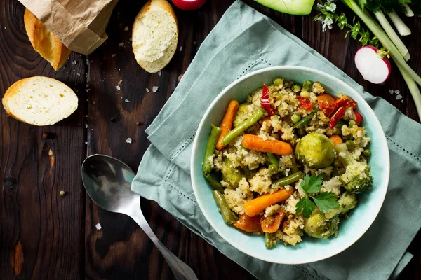 Healthy dietary vegan dish: couscous and vegetables (string bean