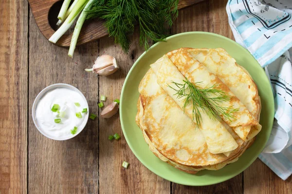 Potato pancakes, not sweet, served with garlic cream sauce on ru — Stock Photo, Image
