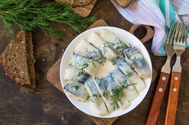Mediterranean food. Seafood. Tasty appetizing pickled mackerel i