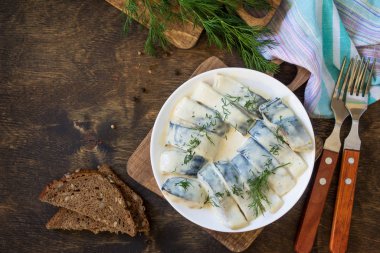 Mediterranean food. Seafood. Tasty appetizing pickled mackerel i