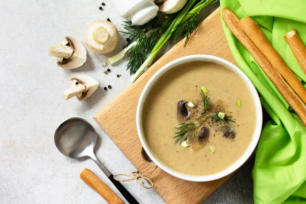 Vegan and diet healthy food. Mushroom soup puree with cream, champignons and vegetables. Top view flat lay. — Stock Image Vegan Diet Healthy Food Mushroom Soup Puree Cream Champignons Vegetables Royalty Free Stock Photos