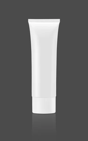 Blank packaging cosmetic tube isolated on gray background — Stock Photo, Image