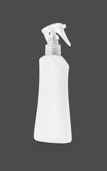 Puste opakowania sprayem na białym tle na szarym tle — Zdjęcie stockowe