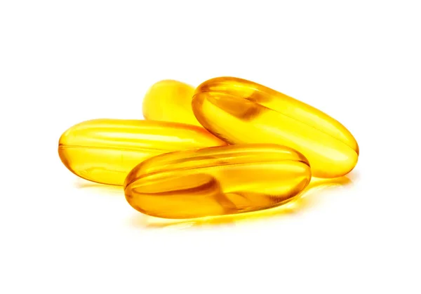 Fish oil supplement capsule isolated on white background Royalty Free Stock Images