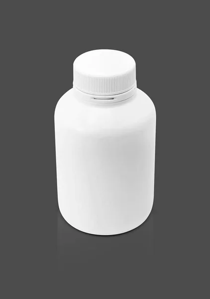 Puste opakowanie suplementu produktu butelki na białym tle na szarym tle — Zdjęcie stockowe