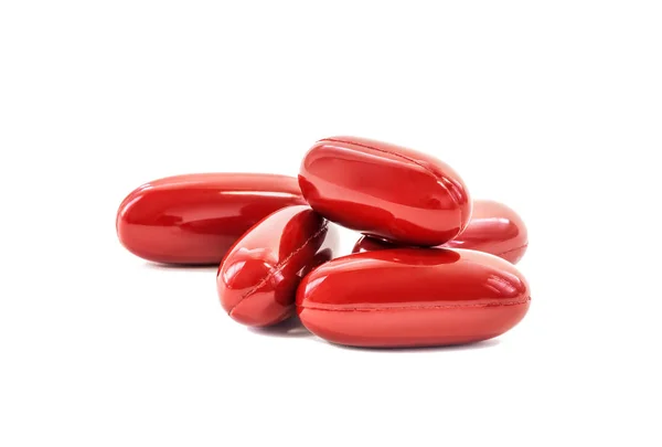 Rode aanvulling capsules geïsoleerd op witte achtergrond Stockfoto