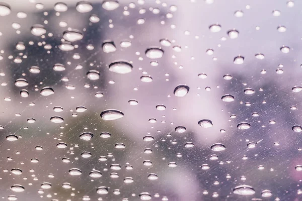 Raindrops on a car windshield after raining — Stock Photo, Image