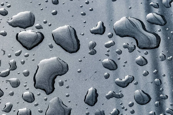 Tekstura krople deszczu na powierzchnię samochodu po deszczu — Zdjęcie stockowe