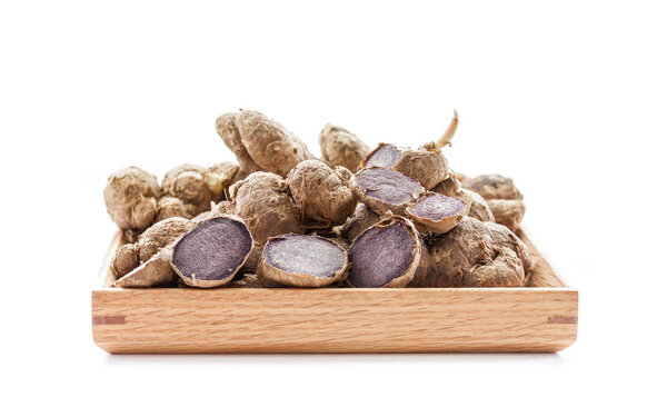 black galingale root isolated on white background