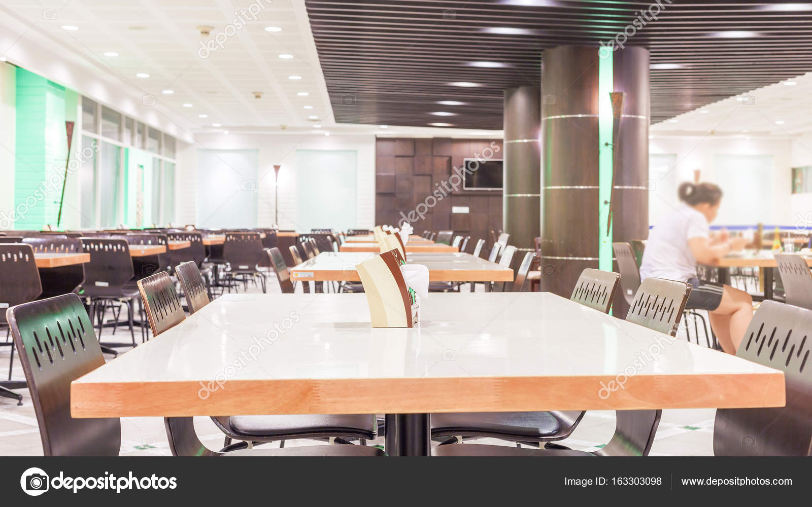 Modern interior of cafeteria or canteen with chairs and tables — Stock