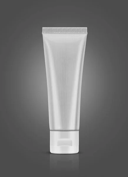 Blank packaging aluminum toothpaste tube isolated on gray background — Stock Photo, Image