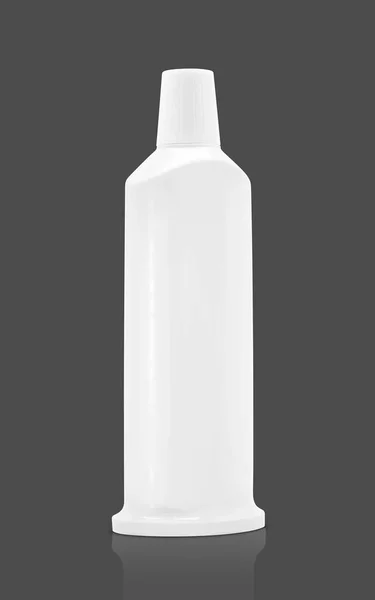 Embalaje en blanco tubo de pasta de dientes de plástico aislado sobre fondo gris — Foto de Stock
