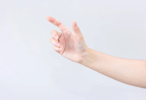 Asian beauty woman hand in holding and showing action isolated on gray background — Stock Photo, Image