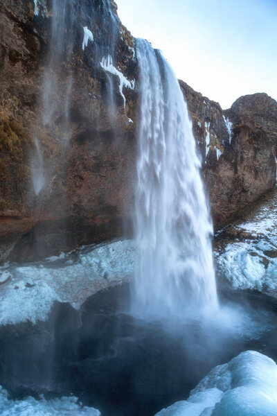 Iceland seljalandsfoss waterfall, winter in Iceland, seljalandsfoss waterfall in winter