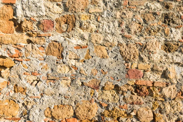 Close up view of an aged textured plastered stone wall — Stock Photo, Image