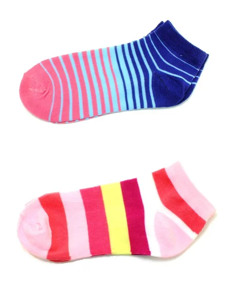 Diversi calzini multicolori su sfondo bianco — Foto Stock