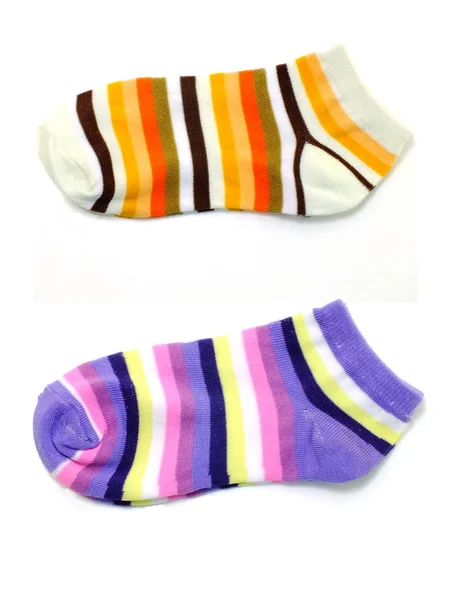 Több több színű zokni fehér alapon — Stock Fotó