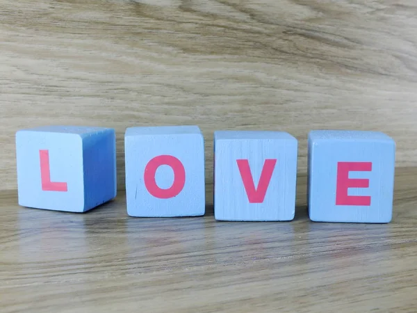 Wort Liebe Auf Hölzernem Hintergrund Valentinstag Hintergrund — Stockfoto