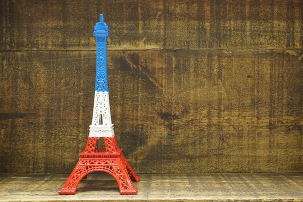 Eiffelova Věž Socha Prostorovým Výtiskem Dřevěném Pozadí — Stock fotografie