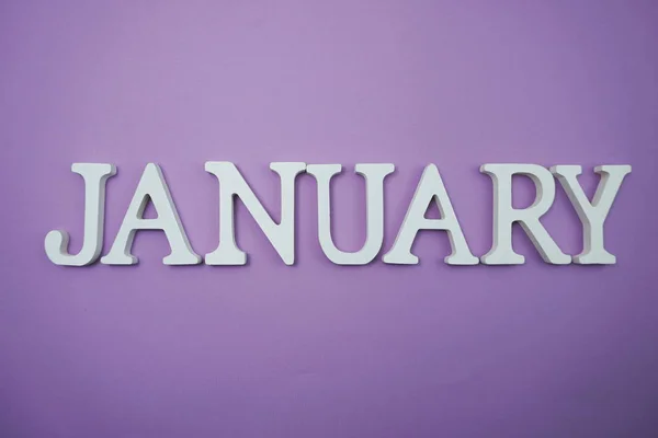 stock image January alphabet letter with space copy on Purple background