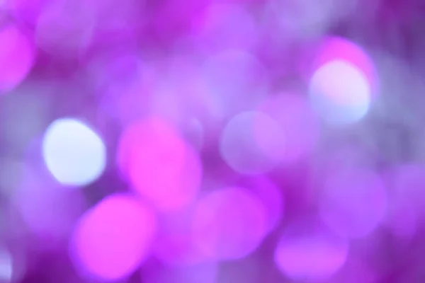 紫色Bokeh抽象色彩背景的模糊灯光 — 图库照片
