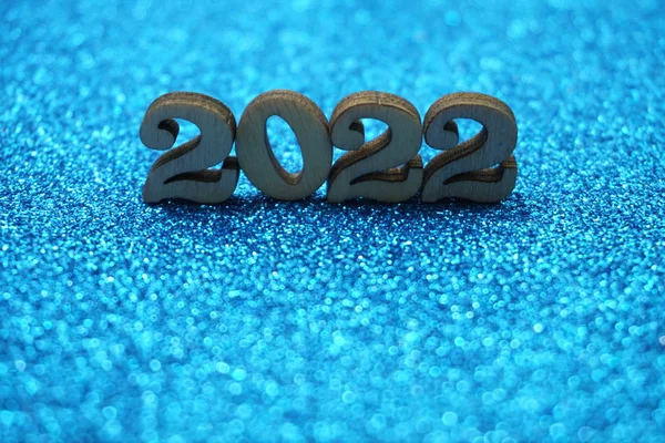 Happy New year 2022 with space copy on blue glitter background