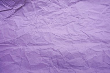 Purple crumpled paper empty background