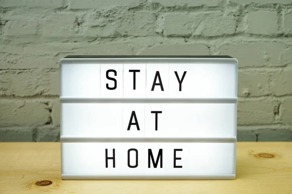 Stay Home Word Letter Light Box White Brick Wall Background — Stock Photo, Image