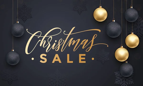 Bannière de vente de Noël avec boules d'or motif flocons de neige — Image vectorielle