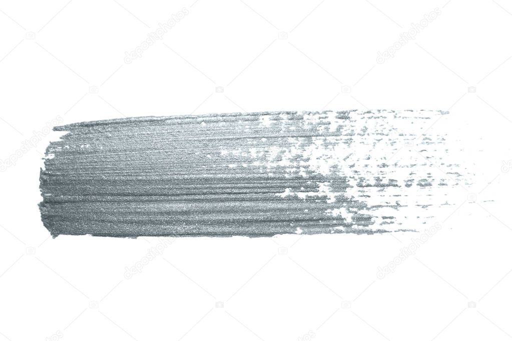 Silver glitter paint brush stroke or abstract dab smear with smudge texture on white background. Isolated glittering sparkling silver paint ink splash stain for luxury greeting card design template