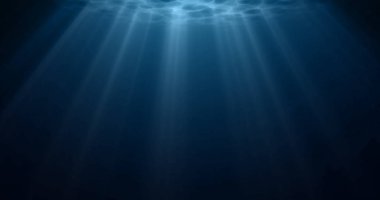Sualtı ışığı, su altında güneş ışığı yüzeyde dalgalanmalarla parlar. Derin suların altında yansıması, mavi okyanusu ya da deniz derinliği mavi arka planı olan gerçekçi güneş ışığı.