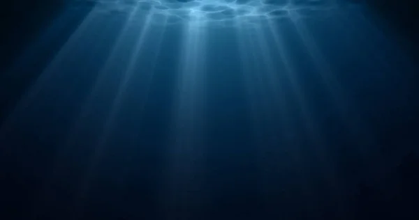 Luz submarina, la luz del sol brilla bajo el agua con ondas en la superficie. Luz solar realista bajo aguas profundas con reflejo, océano azul o fondo azul profundo del mar — Foto de Stock