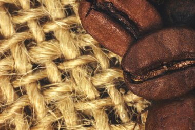 Kahve çekirdekleri closeup doğal doku. Tonda vintage