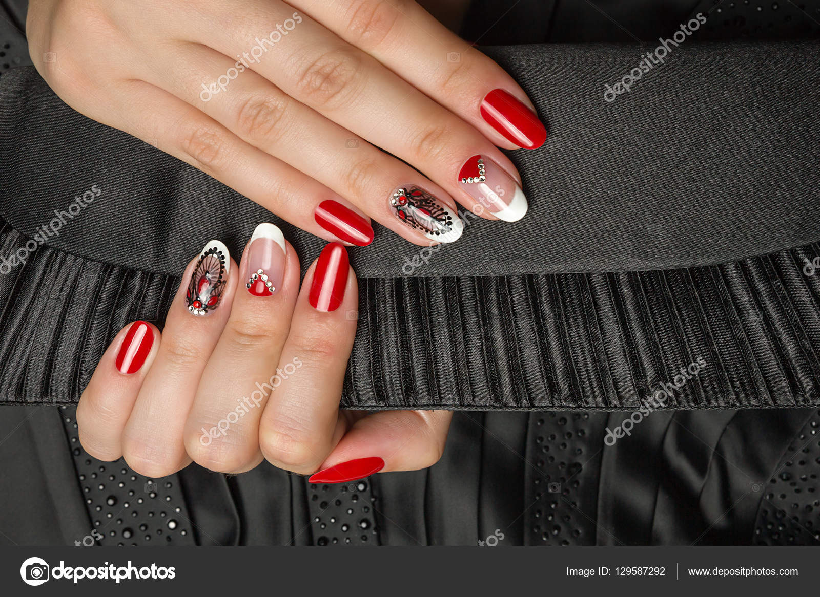 French manicure - beautiful manicured female hands with red black and white manicure with rhinestones on black background Stock Photo by ©Ruslan_Khismatov 129587292 French manicure - beautiful manicured female hands with red black and white manicure with rhinestones on black background Stock Photo by ©Ruslan_Khismatov 129587292