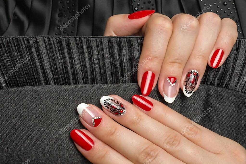 French manicure - beautiful manicured female hands with red black and white manicure with rhinestones on black background Stock Photo by ©Ruslan_Khismatov 129987704 French manicure - beautiful manicured female hands with red black and white manicure with rhinestones on black background Stock Photo by ©Ruslan_Khismatov 129987704
