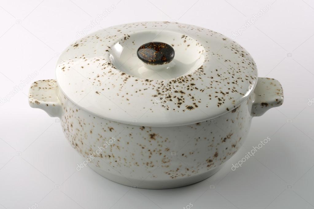 White rustic Casserole and lid isolated on white background