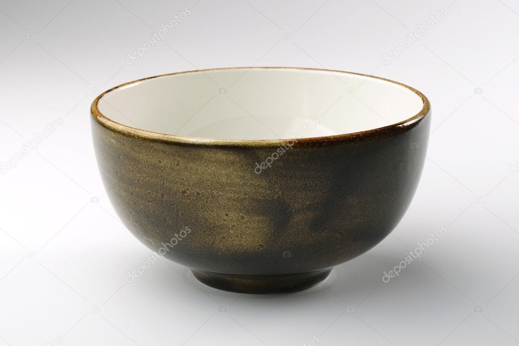 Rustic brown bowl isolated on white background